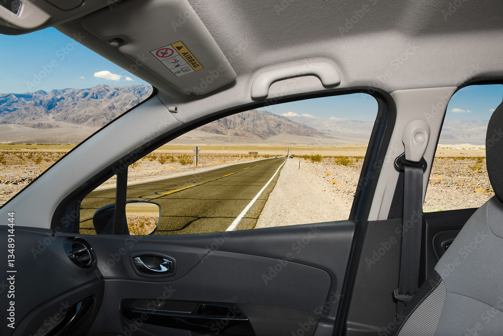 Car window with view of desert road, Death Valley, USA Car window with view of desert road, Death Valley, USA