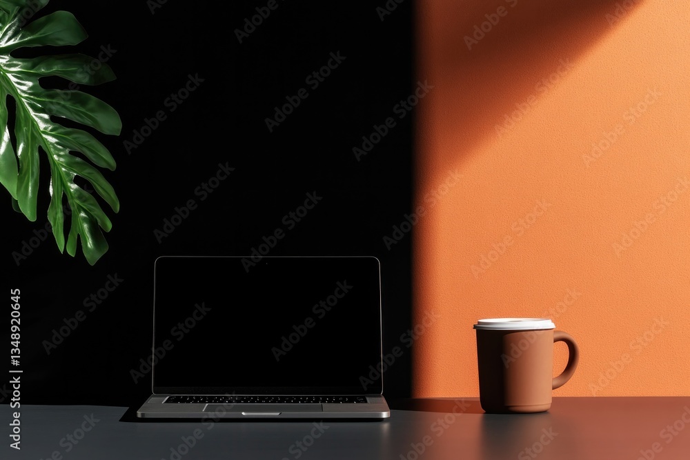 Fototapeta premium Minimalist workspace features laptop, coffee cup, and green plan