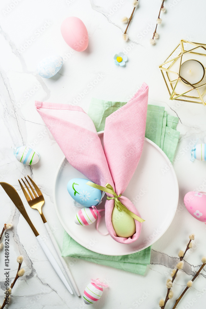 Easter table setting on white background.