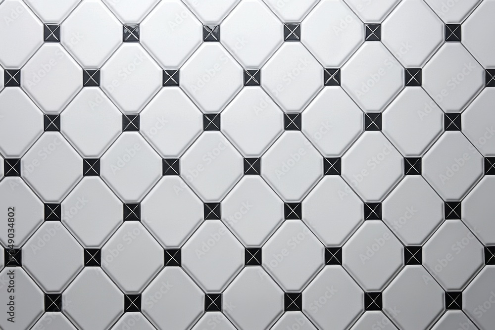 Fototapeta premium Modern bathroom aesthetics showcased through tiled surfaces.