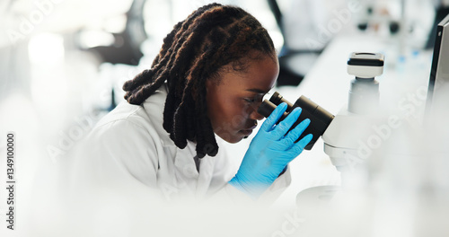 Photos Microscope, scientist and black woman with medical experiment, healthcare innovation or chemistry research