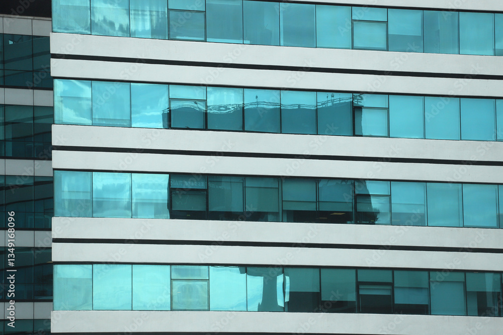 Background of glass windows of a modern office building Background of glass windows of a modern office building