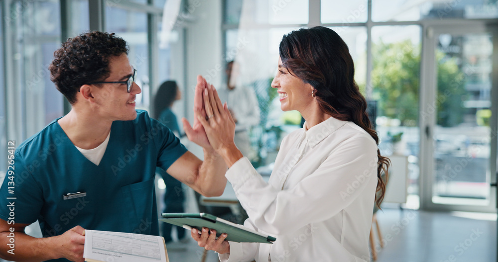 Doctors, smile or high five in hospital, tablet or results with email for treatment funding. People, hand gesture or medical with professional, healthcare or tech with motivation, goals or support Doctors, smile or high five in hospital, tablet or results with email for treatment funding. People, hand gesture or medical with professional, healthcare or tech with motivation, goals or support