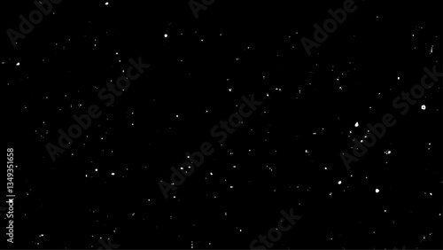 Falling snow isolated on black. Snowfall texture. Place in over picture in screen mode.