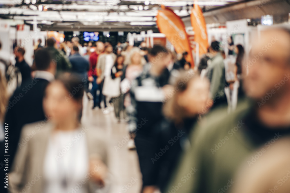 Fototapeta premium Abstract blurred people at exhibition hall of expo event trade show. Business convention show or job fair. Business concept background