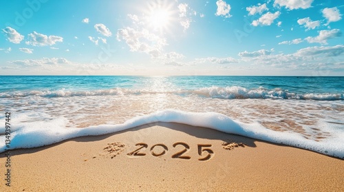 Fototapeta Naklejka Na Ścianę i Meble -  Welcome 2025 Message Written in Soft Sand with Sea
