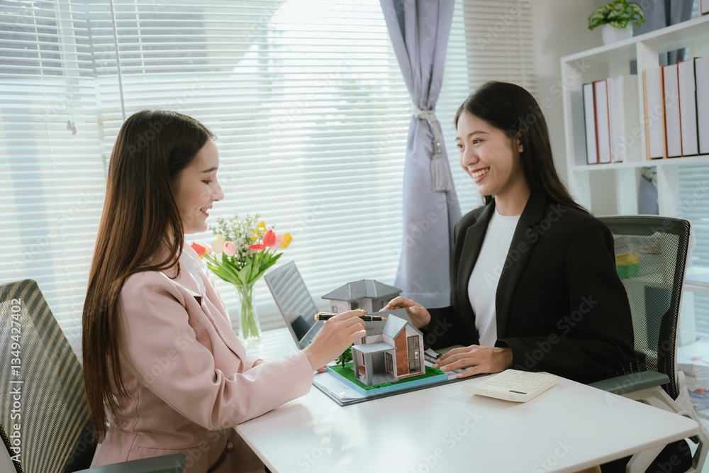 Real estate agents and new homeowners discuss mortgages and insurance coverage for safe investment and ownership. Real estate agents and new homeowners discuss mortgages and insurance coverage for safe investment and ownership.