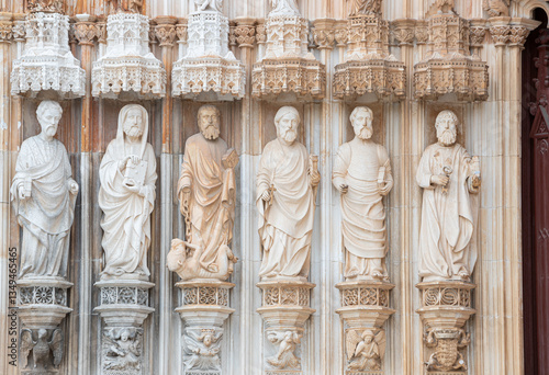 Close up of saint stone statues in Batalha monastery. Intricate details from portuguese gothic architecture