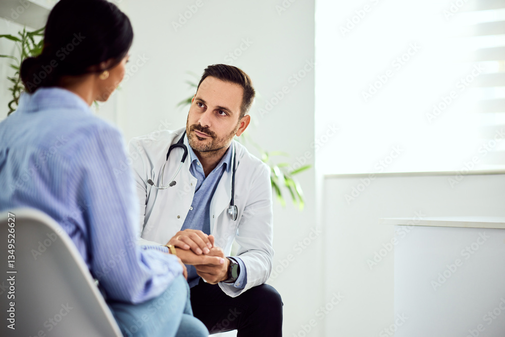 Doctor Consulting Patient During a Medical Appointment in a Clinic Setting Doctor Consulting Patient During a Medical Appointment in a Clinic Setting