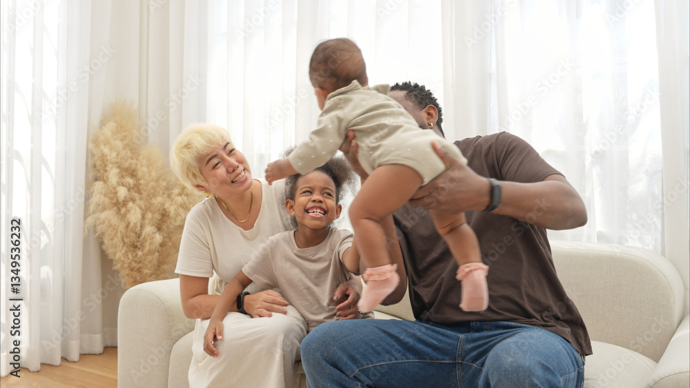 Parents and children relax during their holiday at home Parents and children relax during their holiday at home
