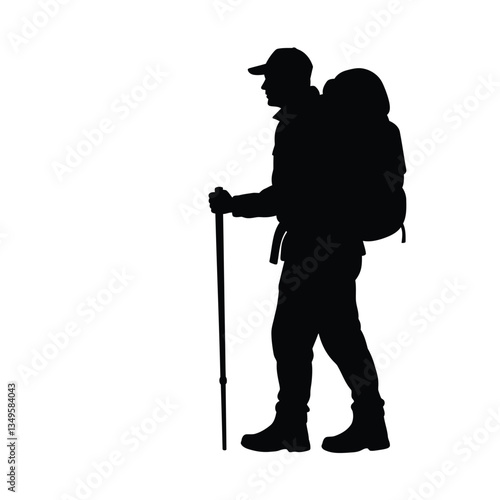 man with backpack walking stick