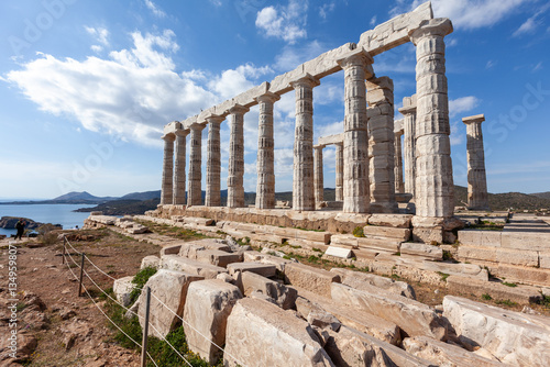 Obraz na płótnie Temple of Poseidon at Sounio Cape, in south Attica region, Greece, Europe. The temple was built in 5th century BC and was dedicated to the god of sea. w salonie