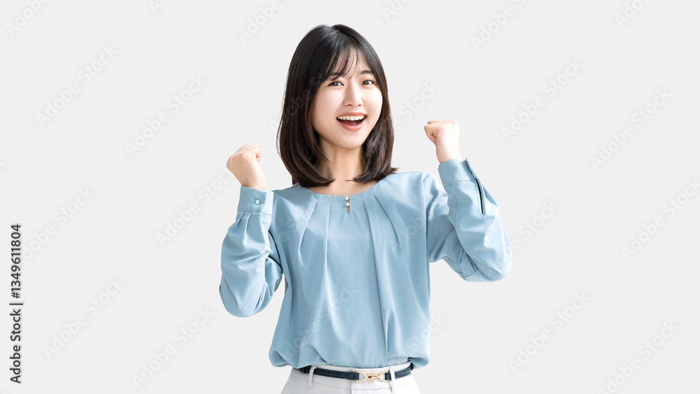 ガッツポーズをする女性・ビジネスウーマン ガッツポーズをする女性・ビジネスウーマン
