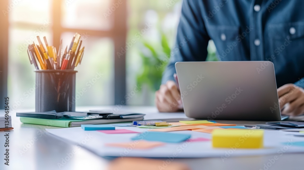Person Working At Desk With Laptop And Sticky Notes Person Working At Desk With Laptop And Sticky Notes