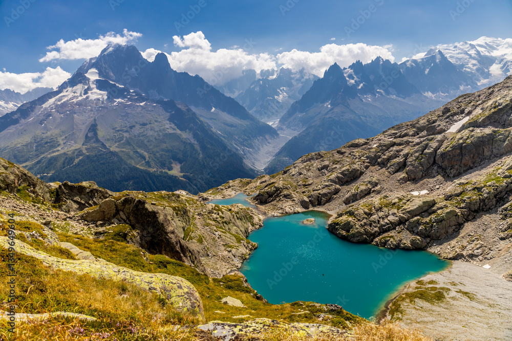 Obraz premium Lac Blanc mountain lake in Chamonix Alps in France. Famous tourist destination and natural attraction beautiful landscape of a turquoise lake in the Alps. Lac Blanc scenic view without tourists