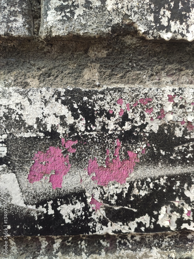 Fototapeta premium Weathered wall with pink graffiti for urban style posters and digital collages