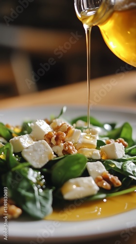 Delicious Spinach Salad Topped With Honey and Walnuts for a Fresh Meal Experi...