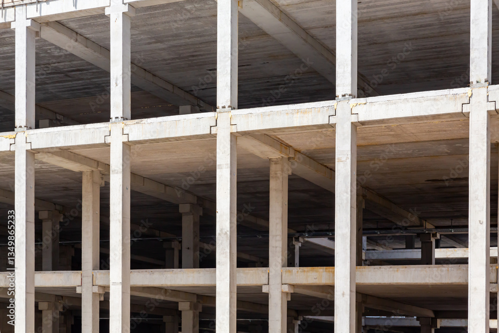 Concrete building structure under construction showcasing industrial architecture and urban development progress Concrete building structure under construction showcasing industrial architecture and urban development progress