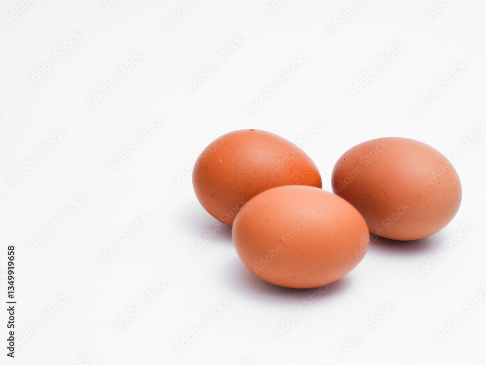 Fresh chicken eggs on a white background. Perfect for projects related to food, healthy eating, cooking, farm products, and advertising Fresh chicken eggs on a white background. Perfect for projects related to food, healthy eating, cooking, farm products, and advertising
