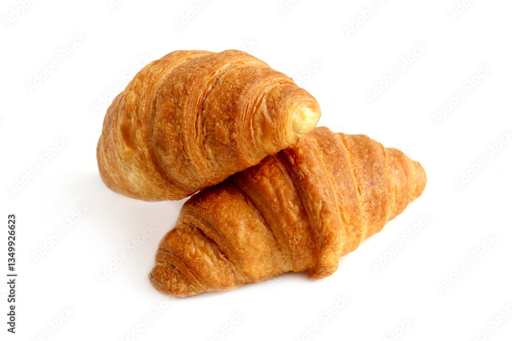There are two fresh croissants on a white background. There are two fresh croissants on a white background.