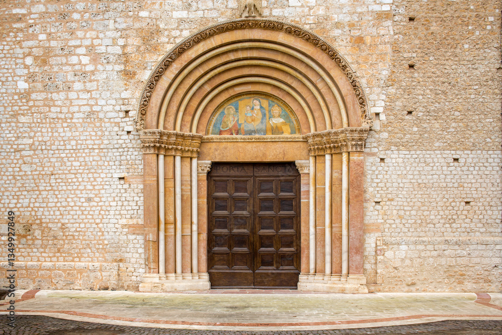Fototapeta premium Closeup of the Holy Door located outside the Basilica of Santa Maria di Collemaggio in L’Aquila, Abruzzo, Italy.