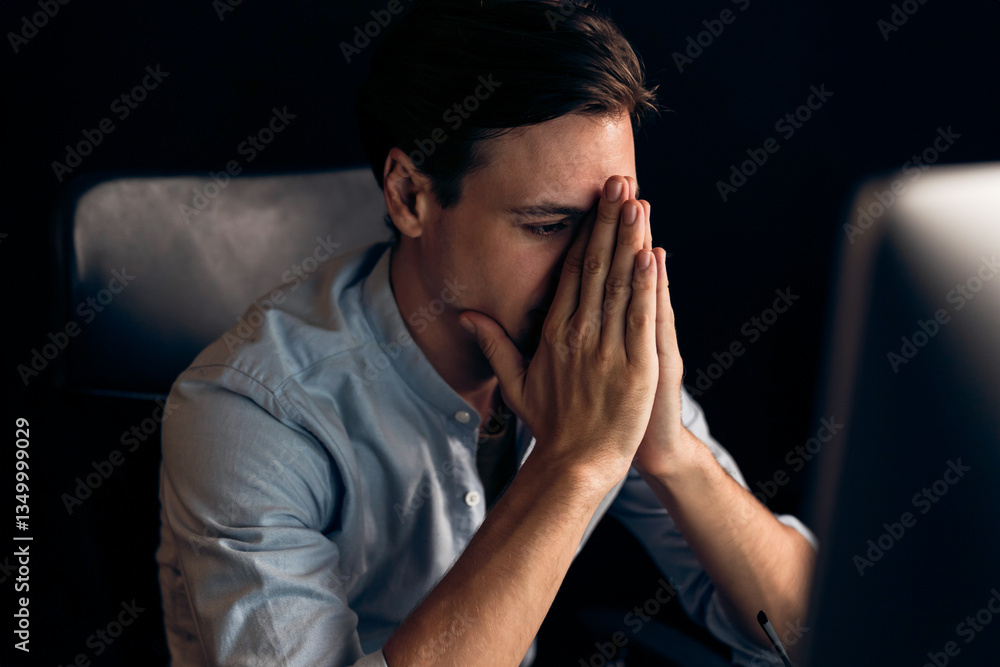 Thinking of stressful financial analyst researching on business paragraph on pc screen with dynamic database marketing analysis planning monthly report at modern home office at night time. Pecuniary. Thinking of stressful financial analyst researching on business paragraph on pc screen with dynamic database marketing analysis planning monthly report at modern home office at night time. Pecuniary.