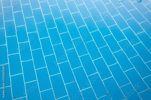 Obraz na płótnie Swimming pool background with distorted tiles below water surface w salonie