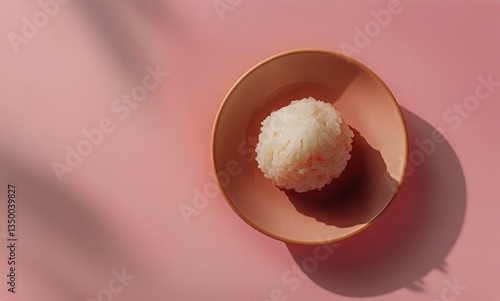 Delicate Sushi Treat Displayed on a Soft Pink Plate in a Minimalistic Setting