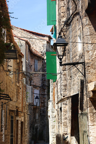 Obraz na płótnie Picturesque Mediterranean street and traditional architectural details in Trogir, Croatia. w salonie