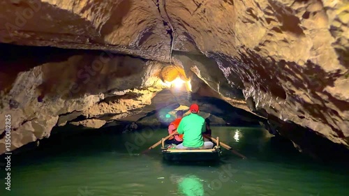 Trang An River Ninh Minh and Bai Dinh Mountain ranges in Vietnam only 3 hours drive from Hanoi. Beautiful winding river and large rising mountains. boats going through the caves in the river
