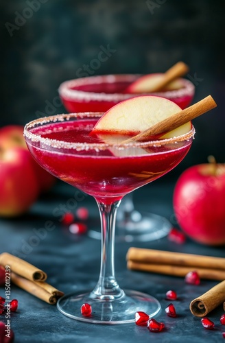 Elegant Red Cocktail With Apple and Cinnamon Garnish on Dark Background