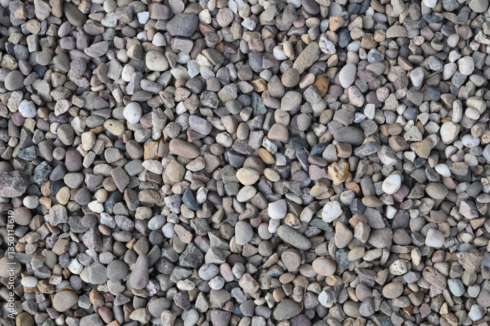 A pile of rocks with a variety of sizes and colors A pile of rocks with a variety of sizes and colors
