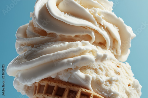 A close-up shot of a perfectly swirled vanilla soft-serve ice cream cone, its creamy texture highlighted under soft studio lighting