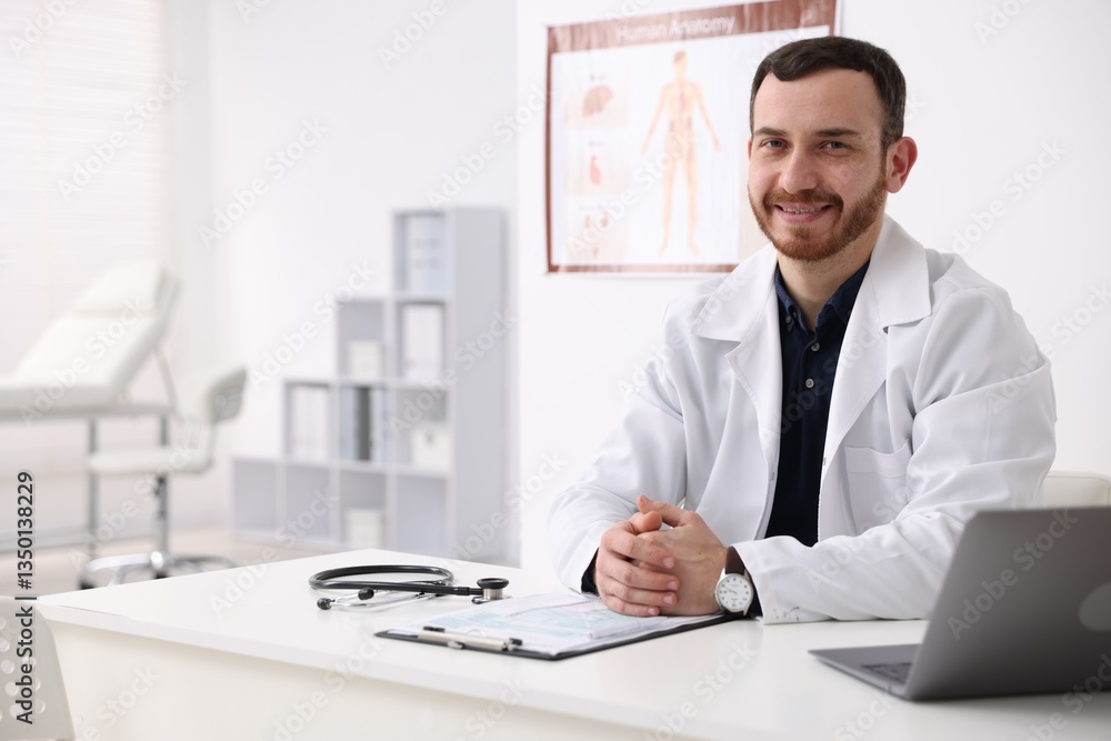 Professional doctor working at desk in hospital. Space for text Professional doctor working at desk in hospital. Space for text