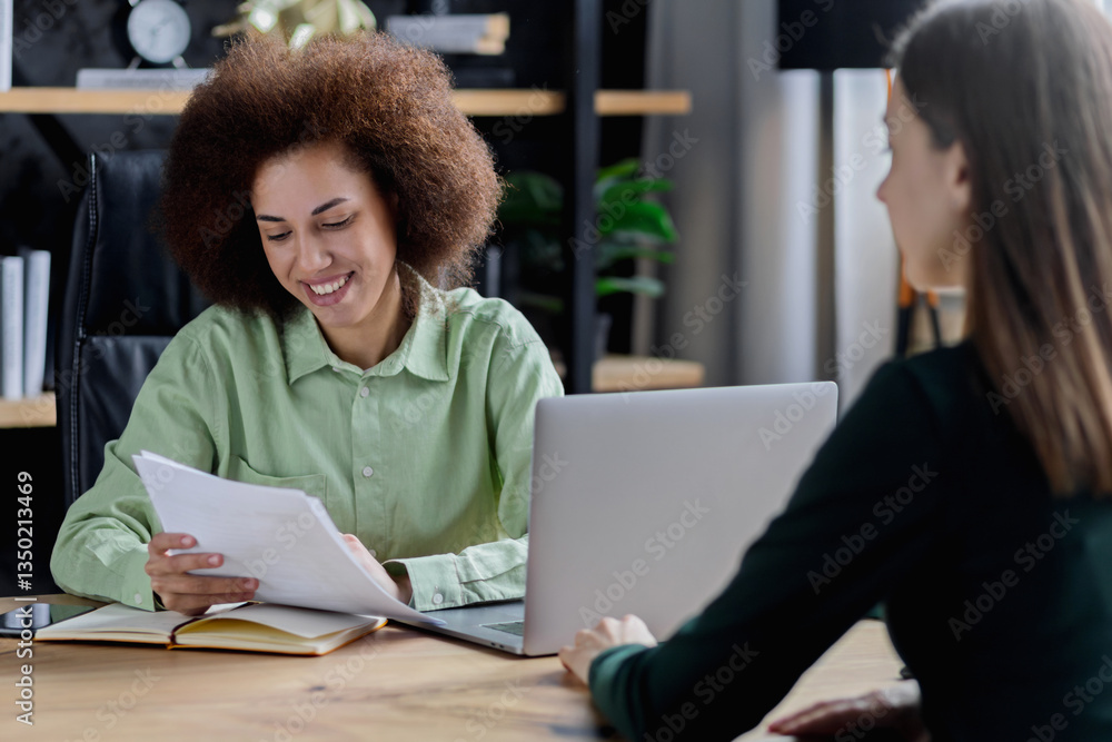 HR specialist interviewing candidate in modern office