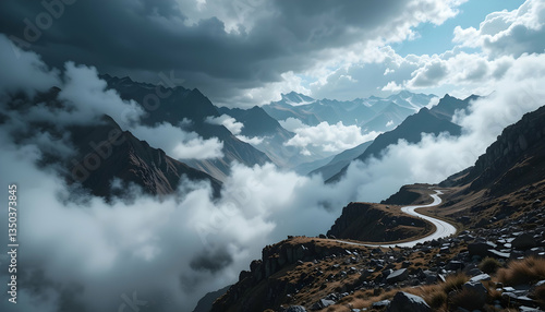 Mountain road winding through clouds dramatic landscape aerial view scenic route travel adventure nature destination journey exploration