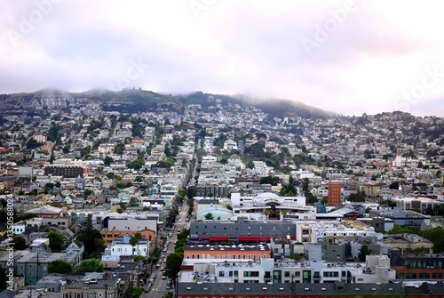 Photography landscape view of san francisco neighborhood, hills, and fog