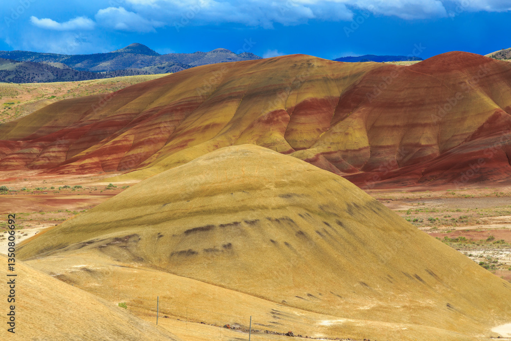 North America, United States, Oregon, Central Oregon, Redmond, Bend, Mitchell. Series of low clay hills striped in colorful bands of minerals, ash and clay deposits. Mounds.
