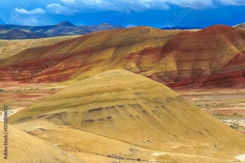 Obraz na płótnie North America, United States, Oregon, Central Oregon, Redmond, Bend, Mitchell. Series of low clay hills striped in colorful bands of minerals, ash and clay deposits. Mounds. w salonie