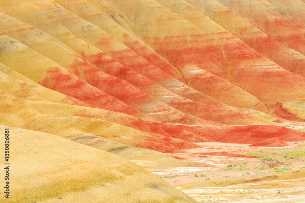 North America, United States, Oregon, Central Oregon, Redmond, Bend, Mitchell. Series of low clay hills striped in colorful bands of minerals, ash and clay deposits.