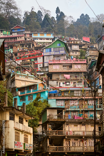Houses on steep hill in Darjeeling city, India