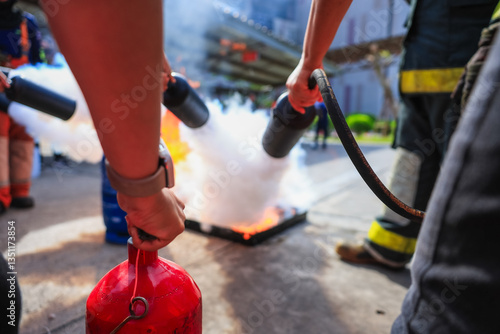 Company employees are undergoing basic fire extinguishing training, fire extinguisher use, safety week, fire prevention, loss prevention,