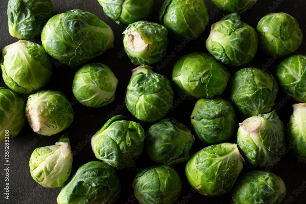 A top down view of a layer of Brussels sprouts, as a background. A top down view of a layer of Brussels sprouts, as a background.