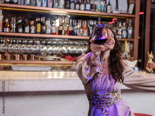 Obraz na płótnie woamn dancing happily in night life in a pub, restaurant, bar. Concept, relax, holiday. w salonie