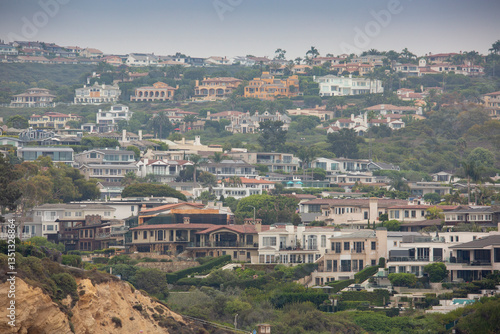 Obraz na plátně A view of a hill full of large mansions, seen in Newport Beach, California