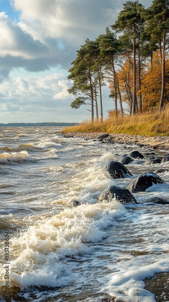 A serene lake scene with rocky shoreline and lush trees in the background, perfect for use in travel or nature-themed projects