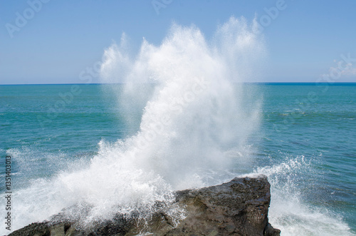 waves crashing on rocks