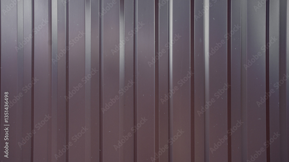 Dark metal sheet with vertical ridges creating a modern industrial texture. Ideal for use in architectural, construction, and design projects, as well as a stylish background for branding and ad Dark metal sheet with vertical ridges creating a modern industrial texture. Ideal for use in architectural, construction, and design projects, as well as a stylish background for branding and ad