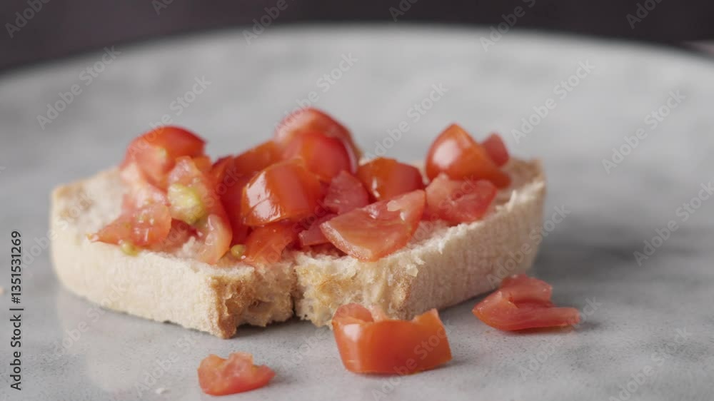 Extreme close up of unseasoned Bruschetta bread in the middle of a plate. Plate spinning slowly to the right side. Bruschetta, an Italian appetizer. Food footage.