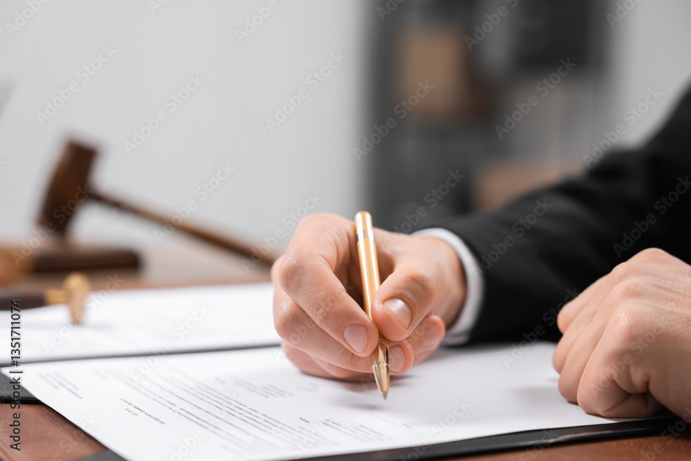 Notary signing document at table in office, closeup. Space for text Notary signing document at table in office, closeup. Space for text